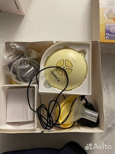 Молокоотсос электрический Medela