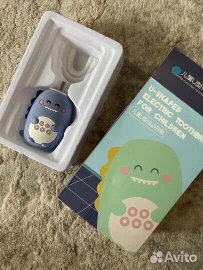 Электрическая зубная щетка