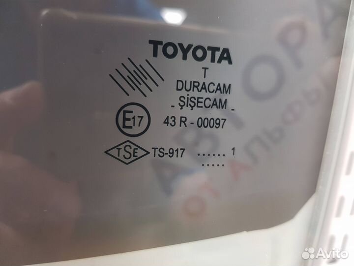 Стекло двери задней левой toyota
