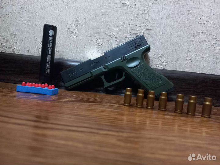 Игрушечный пистолет