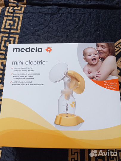 Молокоотсос medela электрический