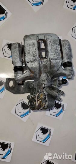 Суппорт задний, левый тормозной Хонда Цивик 4 д