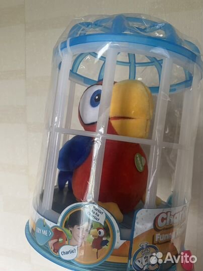Игрушка говорящий попугай