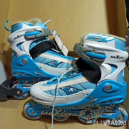 Роликовые коньки новые