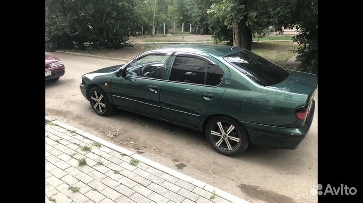 Nissan Primera 1.6 МТ, 1997, битый, 300 000 км