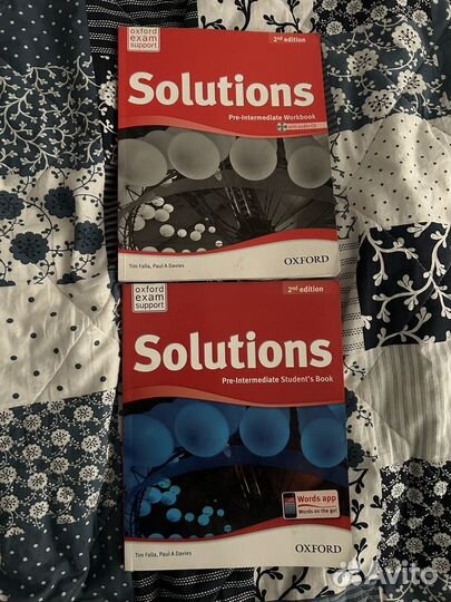 Учебник и тетрадь по английскому языку Solutions