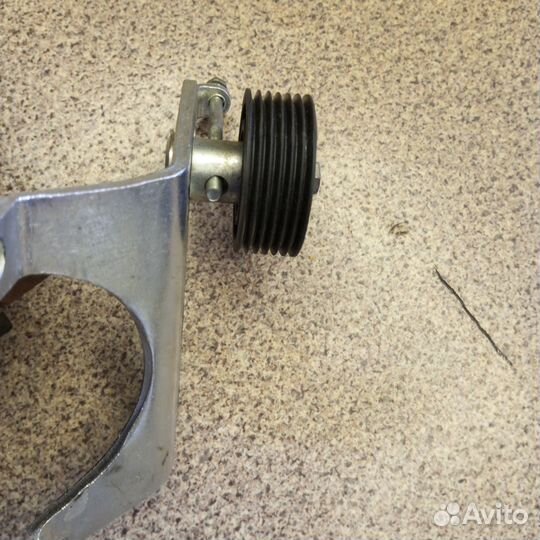 Натяжной ролик