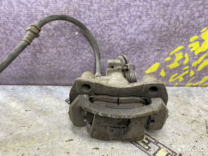 Суппорт тормозной задний правый Спектра Spectra