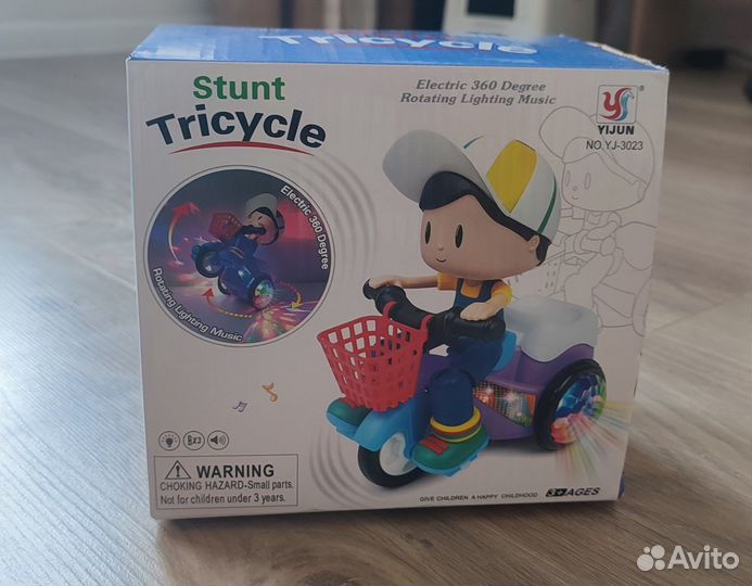 Интерактивная игрушка мальчик на велосипеде