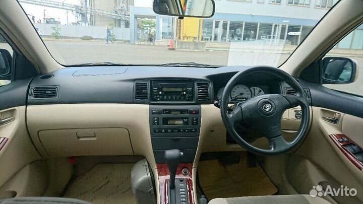 Подлокотник на Toyota Corolla Runx NZE124