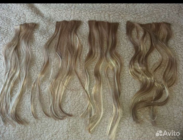 Пряди волос на заколках