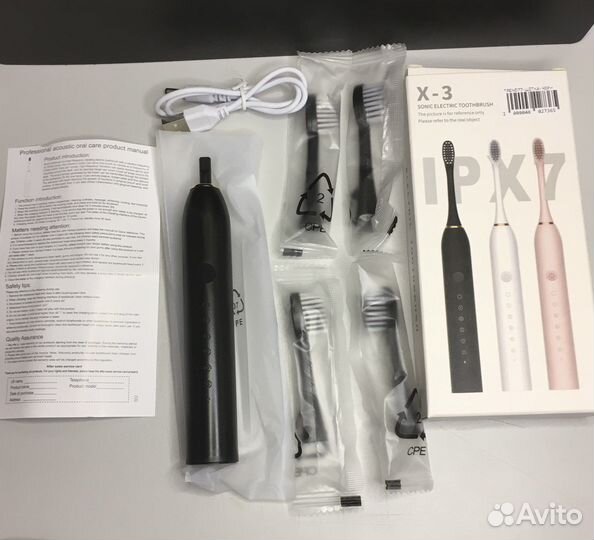 Электрическая зубная щетка