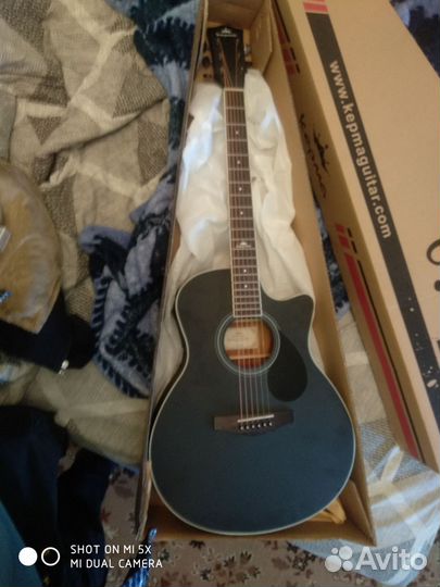 Акустическая гитара