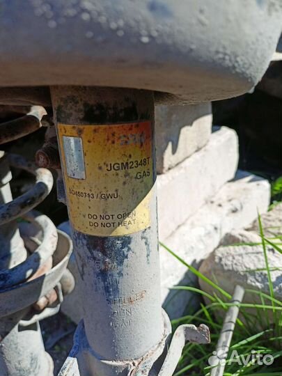 Передние стойки Оpel Astra G