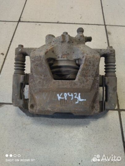 Суппорт тормозной передний левый Chevrolet Cruze