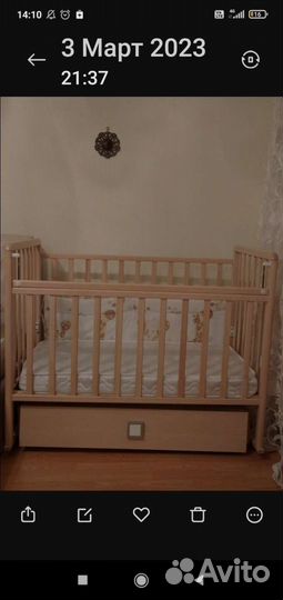 Детская кроватка с маятником и ящиком