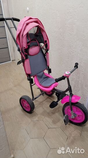 Трехколесный велосипед с ручкой