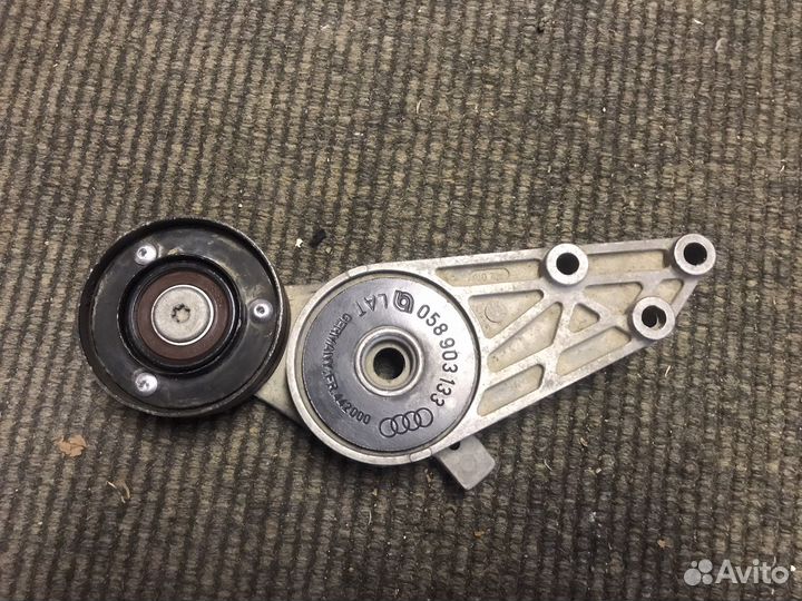 Натяжитель ремня генератора VW Passat Golf Bora