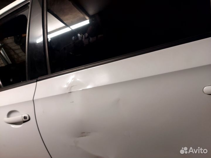 Дверь задняя левая Scoda Rapid