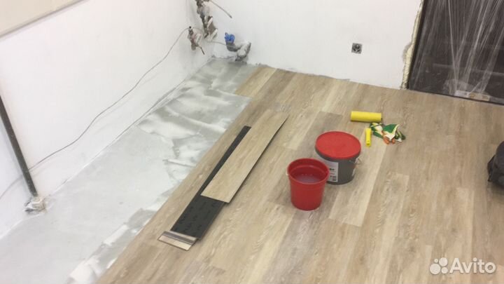 Укладка ламината и монтаж плинтуса