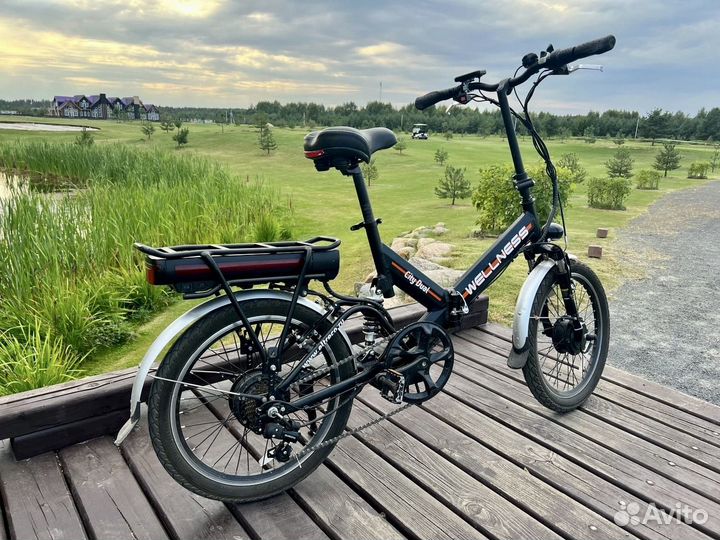 Электровелосипед полноприводный wellness city dual