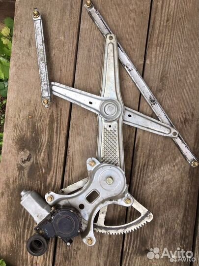 Стеклоподъемник на тойота королла е120 левий