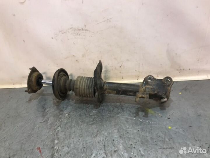 Стойка подвески передняя правая Nissan Almera N16