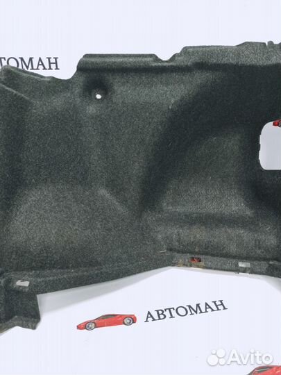 Обшивка багажника правая Toyota Corolla E150