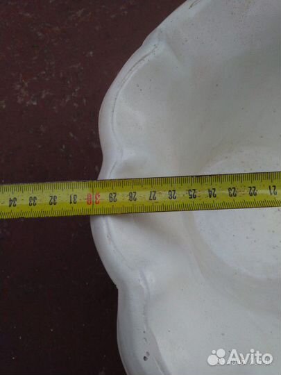 Декоративная фигурка мальчика с ракушкой