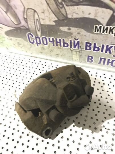 Суппорт тормозной передний правый Volkswagen Trans