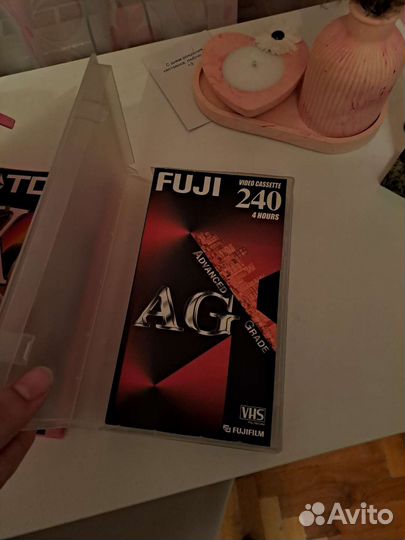 Видеокассеты в кейсах