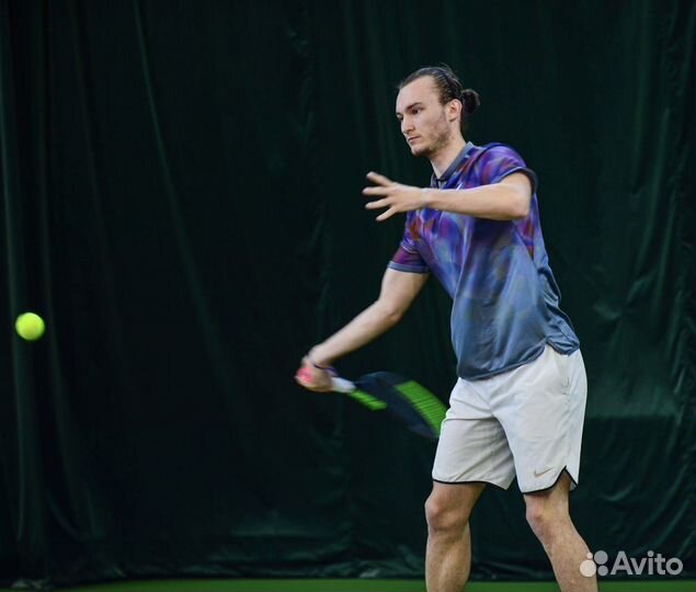 Тренер по большому теннису