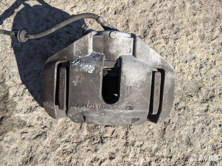 Суппорт тормозной передний левый BMW 5 6756303