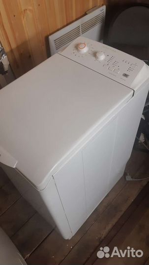 Стиральная машинка с вертикальной загрузкой