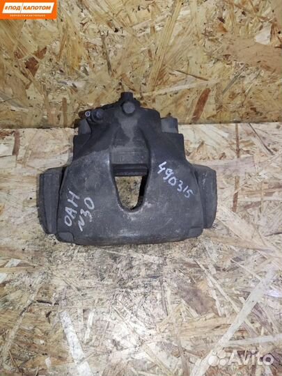 Суппорт тормозной передний правый Opel Astra H