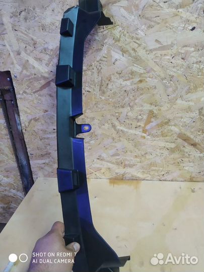 Кронштейн переднего бампера Мазда