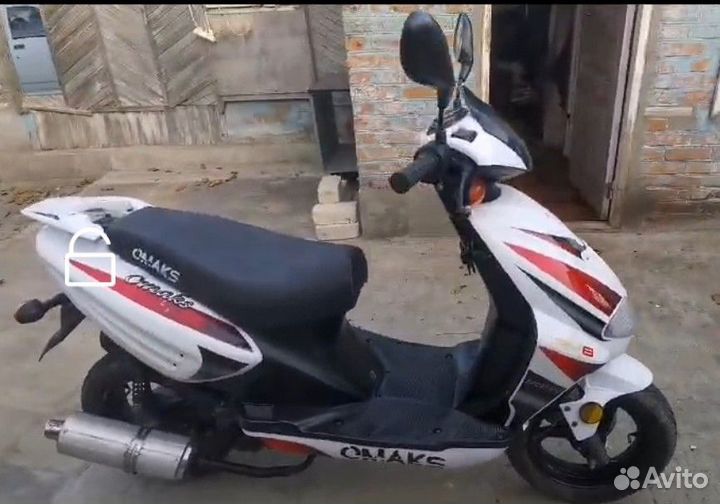 Скутер omaks