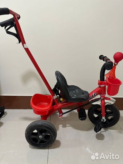 Трехколесный велосипедс ручкой