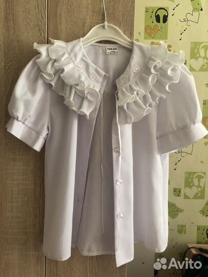 Блузка на девочку 134