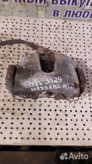 Суппорт передний правый Mazda 3 BL