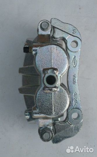 Суппорт 581804HA00 передний левый