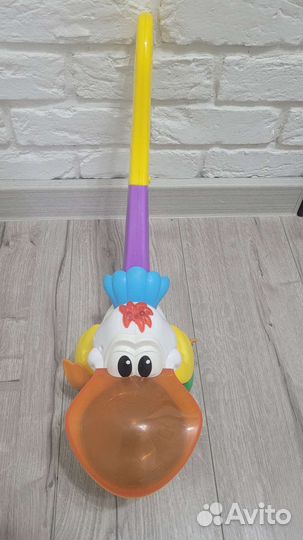 Каталка пеликан поющая