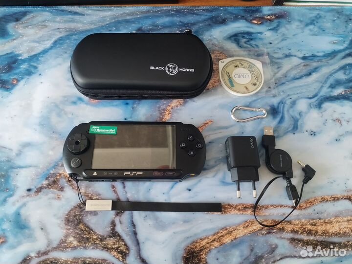 Sony PSP e 1008 прошитая + много игр