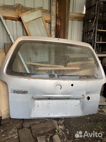 Крышка багажника Mazda Demio 1999