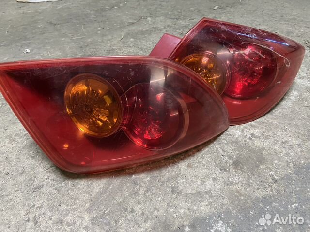 Задние фары mazda axela (bk) 2004