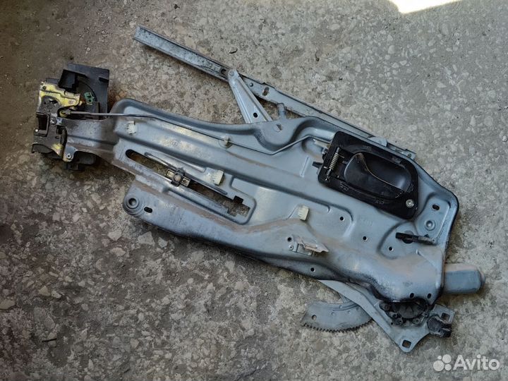 Стеклоподъемник передний левый Laguna 1