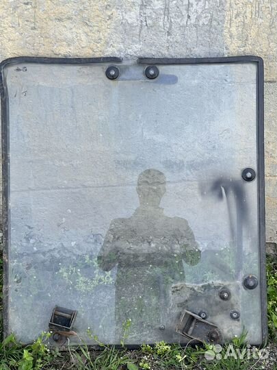 Стекло трактора