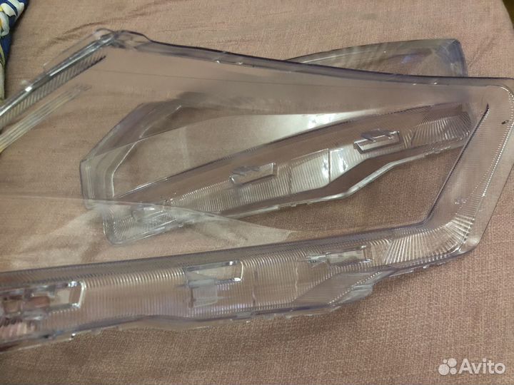 Стекла фар на skoda rapid