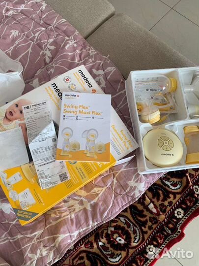 Молокоотсос medela электрический