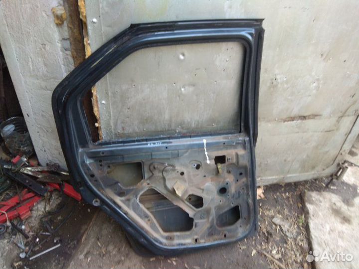 Дверь боковая задняя левая Renault Logan 1
